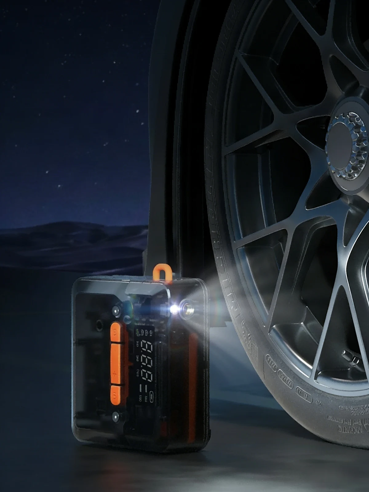 Q5 connected to a car tyre in the supplied night-time product artwork